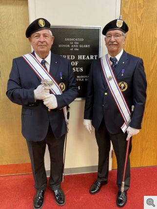 Tom Donnelly and Gary Wolfer displaying the Silver Rose